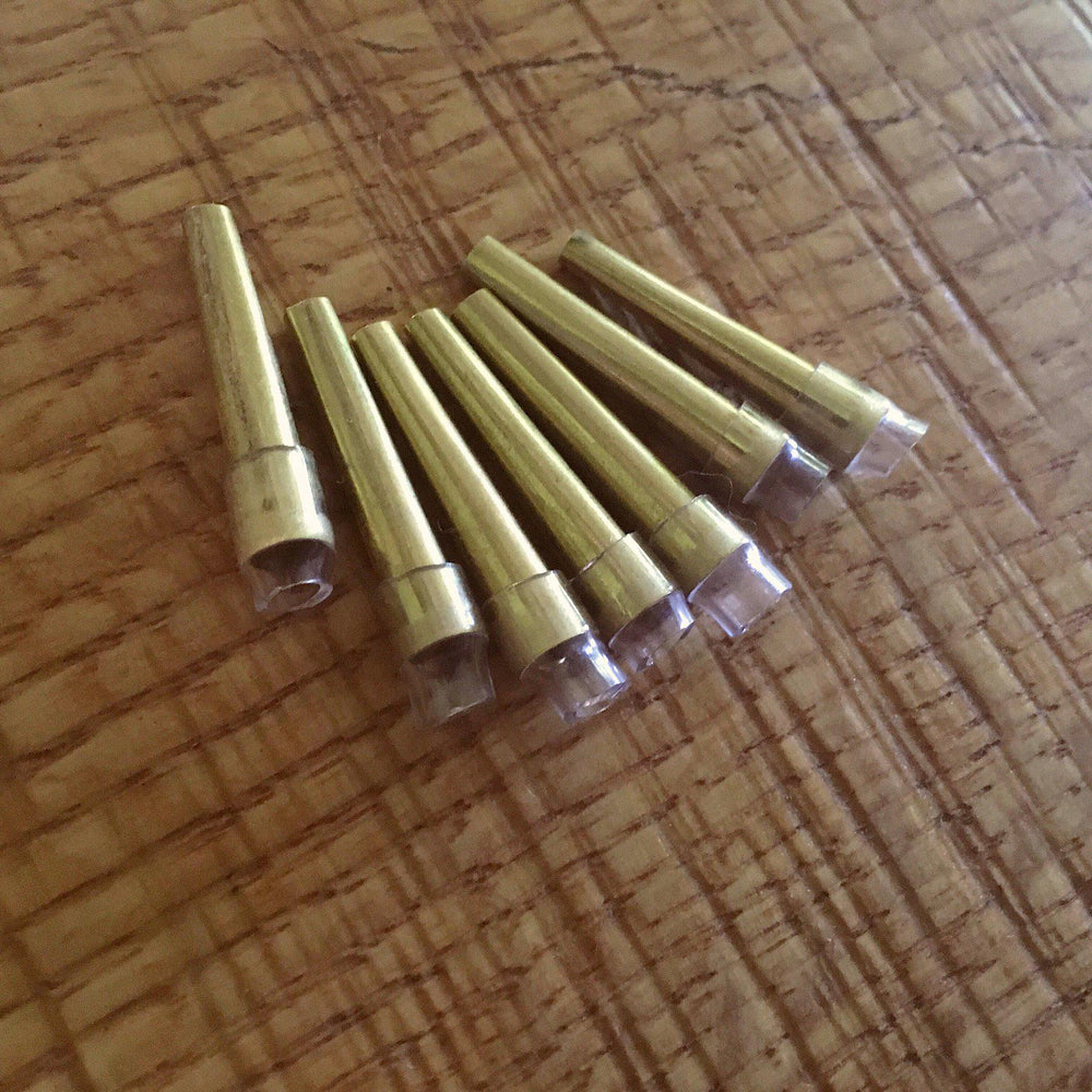 brass English horn staples with rubber tubing. Ready to be made into your best English horn reeds.