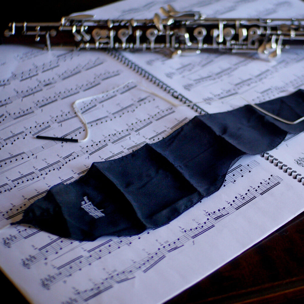 black silk oboe swab, used to clean the inside of the oboe